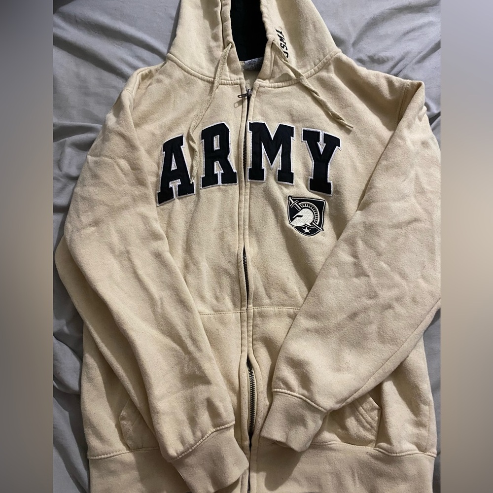 cream and black U.S. military zip up hoodie